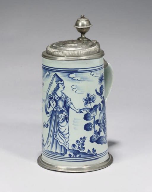A GERMAN FAYENCE BLUE AND WHITE PEWTER-MOUNTED CYLINDRICAL TANKARD (WALZENKRUG)