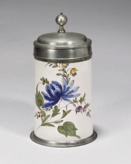 A GERMAN FAYENCE POLYCHROME PEWTER-MOUNTED CYLINDRICAL TANKARD (WALZENKRUG)