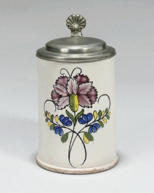 A GERMAN FAYENCE POLYCHROME PEWTER-MOUNTED TANKARD