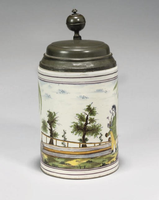 A GERMAN FAYENCE POLYCHROME PEWTER-MOUNTED CYLINDRICAL TANKARD (WALZENKRUG)
