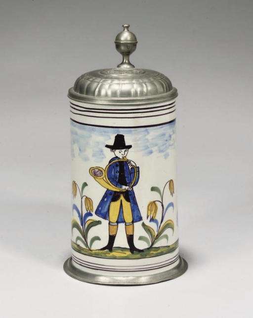 A GERMAN FAYENCE POLYCHROME PEWTER-MOUNTED CYLINDRICAL TANKARD (WALZENKRUG)