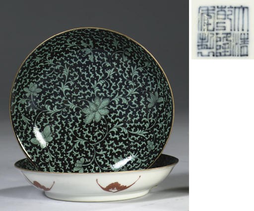 A pair of green-glazed black-ground saucer dishes