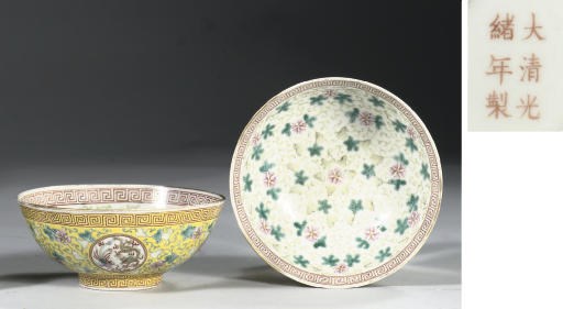 A pair of famille rose yellow-ground bowls