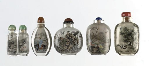 An assorted group of seven inside-painted glass and crystal snuff bottles