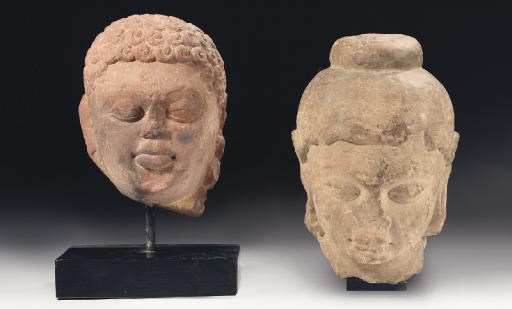 Two Indian sandstone heads