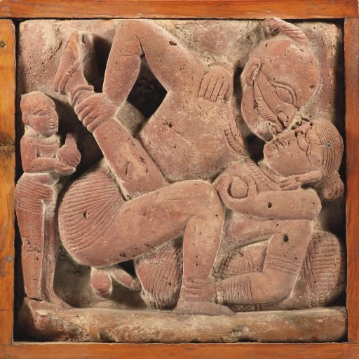 A North Indian terracotta stele with mithuna scene