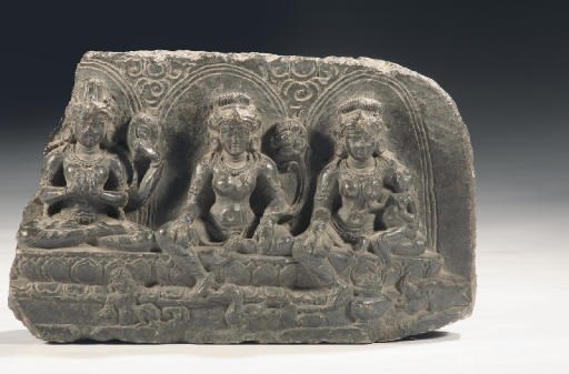 A Northeast Indian phyllite stone stele depicting three female deities