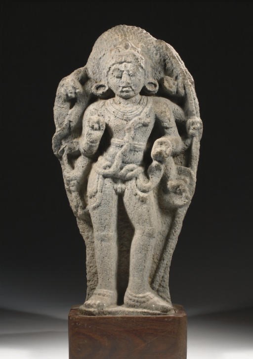 A South Indian, Kerala, granite stele depicting Bhairava