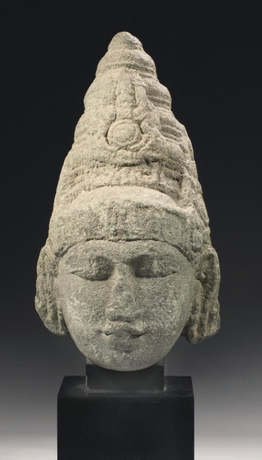 A South Indian, Vijayanagar, granite head of probably Vishnu