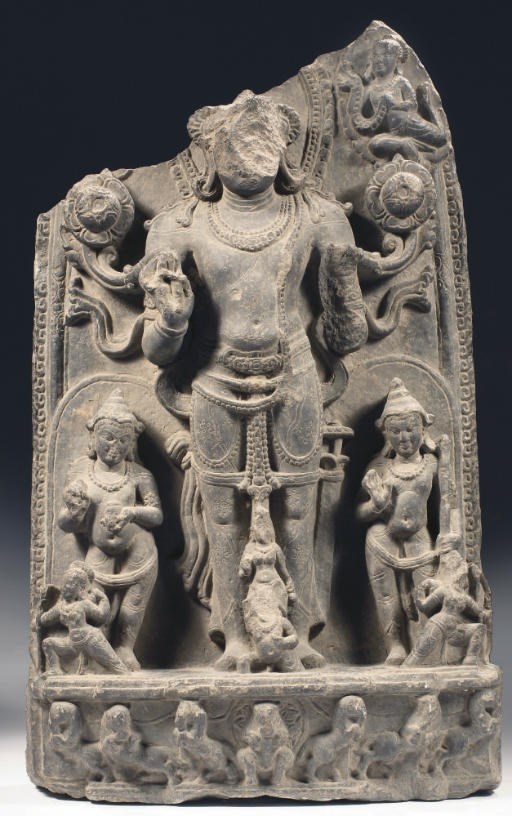 A Northeast Indian, Pala period, phyllite stone stele depicting Surya