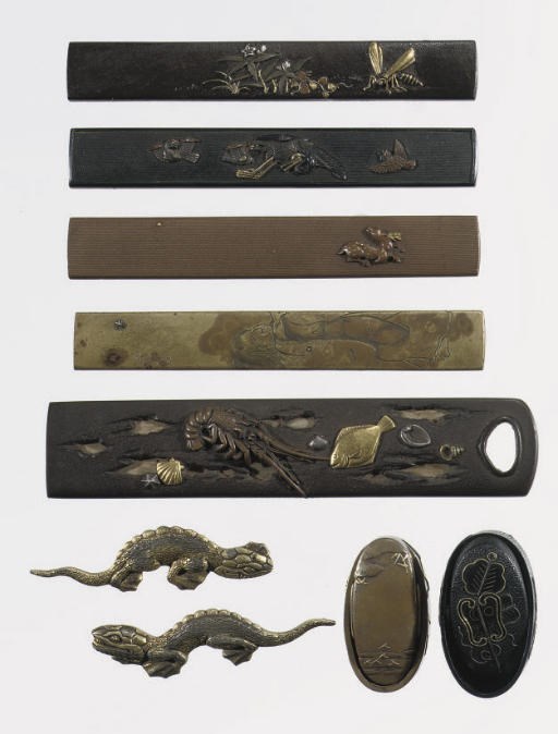 An assorted group of Japanese kozuka, menuki and Kashira