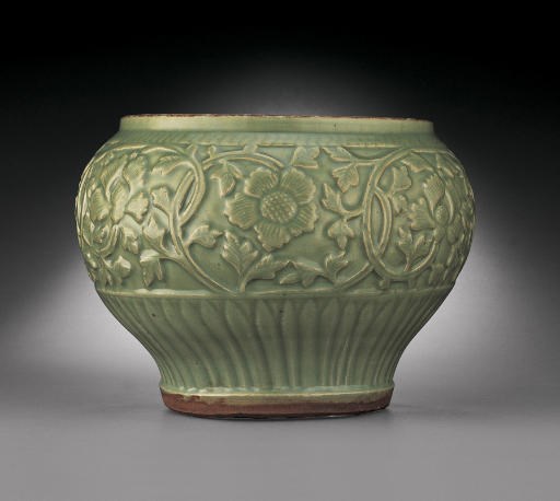 A LONGQUAN CELADON CARVED BALUSTER JAR, GUAN