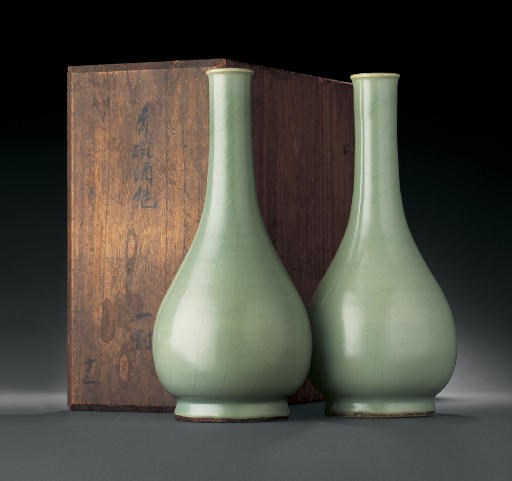 AN UNUSUAL PAIR OF LONGQUAN CELADON BOTTLE VASES