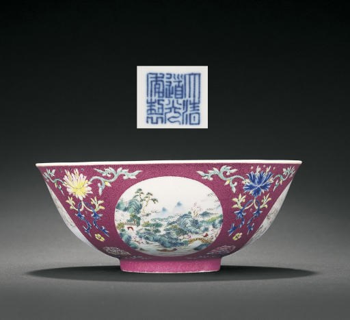 A FINE FAMILLE ROSE RUBY-GROUND 'LANDSCAPE' MEDALLION BOWL