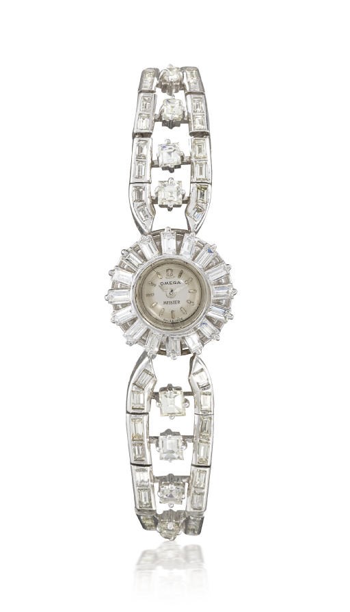OMEGA. AN ELEGANT LADY'S PLATINUM AND DIAMOND-SET WRISTWATCH WITH BRACELET