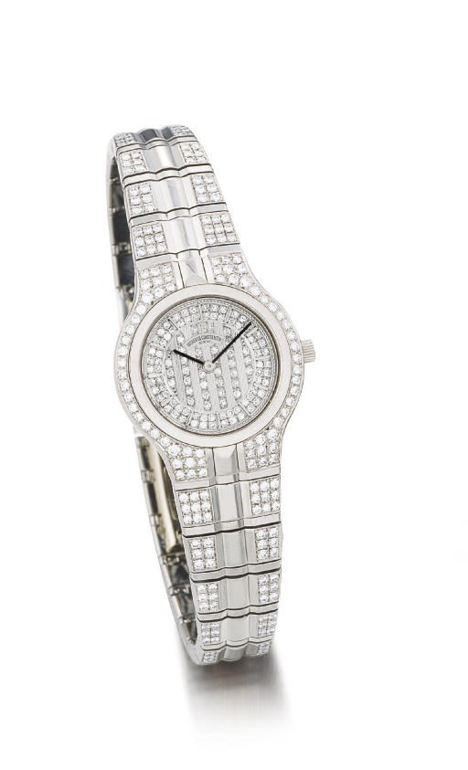 VACHERON CONSTANTIN. A LADY'S 18K WHITE GOLD AND DIAMOND-SET WRISTWATCH WITH BRACELET