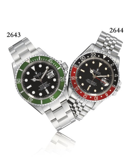 ROLEX. A STAINLESS STEEL AUTOMATIC TWO TIME ZONE WRISTWATCH WITH BRACELET, CENTRE SECONDS AND DATE