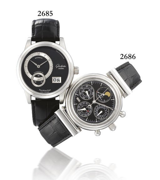 IWC. A STAINLESS STEEL AUTOMATIC PERPETUAL CALENDAR CHRONOGRAPH WRISTWATCH WITH PHASES OF THE MOON