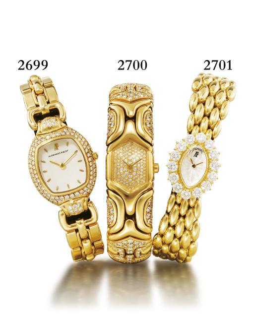 AUDEMARS PIGUET. A LADY'S 18K GOLD AND DIAMOND-SET OVAL WRISTWATCH WITH BRACELET