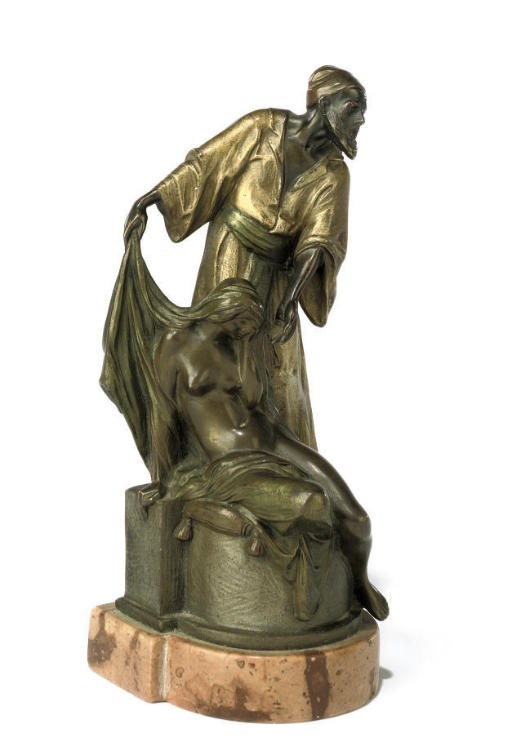 A COLD-PAINTED BRONZE FIGURE GROUP OF A DEALER AND SLAVE