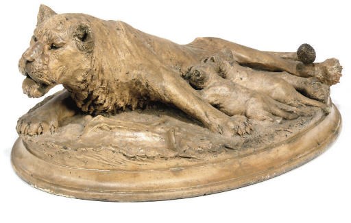 A TERRACOTTA GROUP OF A LIONESS AND CUBS