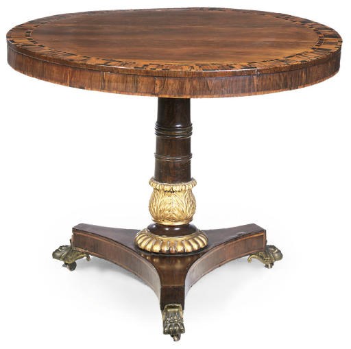 A REGENCY ROSEWOOD AND CROSSBANDED BREAKFAST TABLE