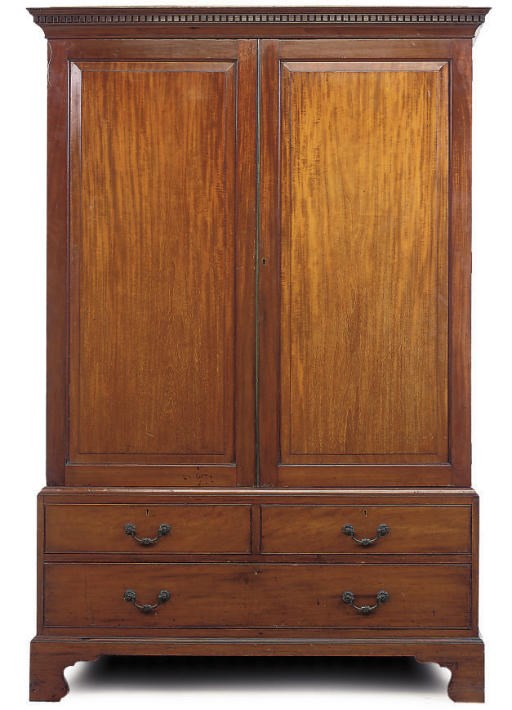 A LATE VICTORIAN MAHOGANY LINEN PRESS