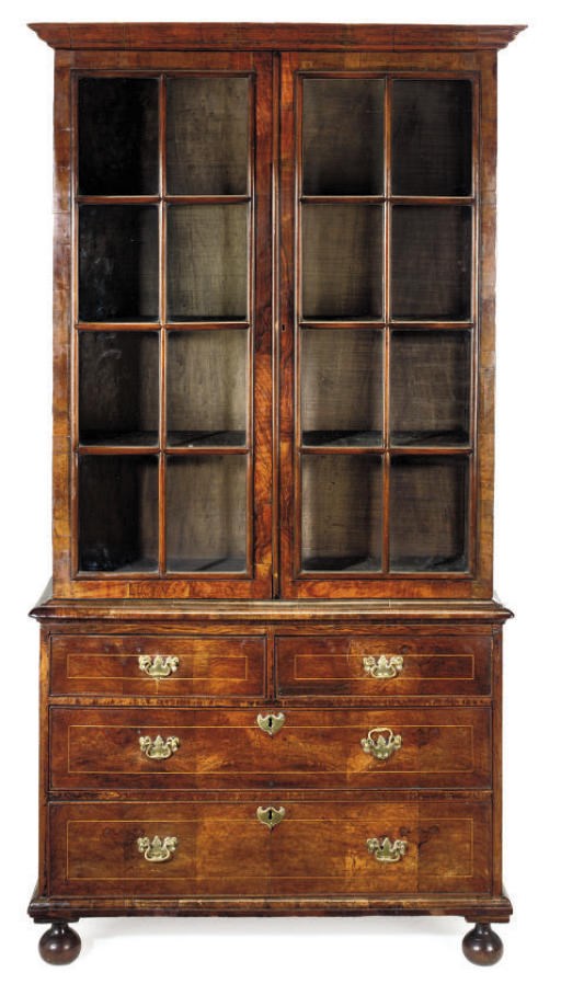 A WALNUT AND LINE INLAID BOOKCASE