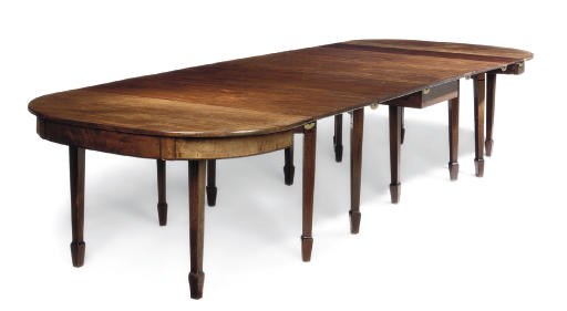 A GEORGE III MAHOGANY D-END DINING TABLE