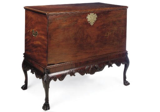 AN IRISH MAHOGANY CHEST ON STAND
