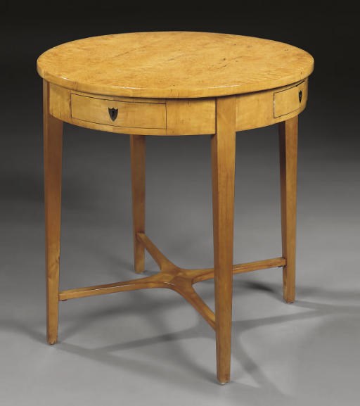 A BIEDERMEIER BIRCH, MASUR BIRCH AND EBONISED CIRCULAR CENTRE TABLE