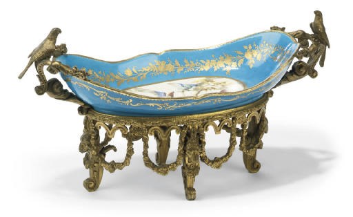 A GILT-BRONZE MOUNTED SÈVRES STYLE PORCELAIN BON-BON DISH