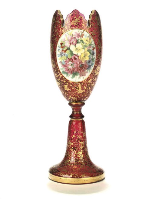 A BOHEMIAN GILT-HEIGHTENED RUBY GLASS VASE