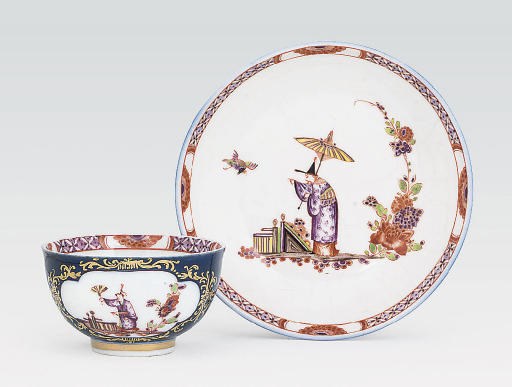 A MEISSEN BLUE-GROUND CHINOISERIE TEABOWL AND SAUCER