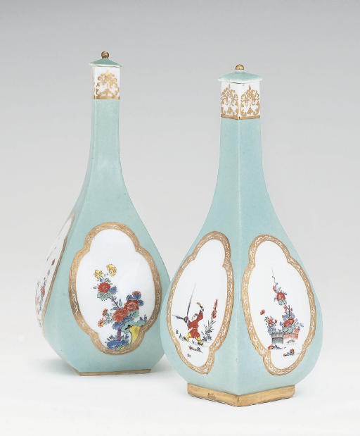 A PAIR OF MEISSEN SELADON-GROUND SAKE-BOTTLES AND COVERS