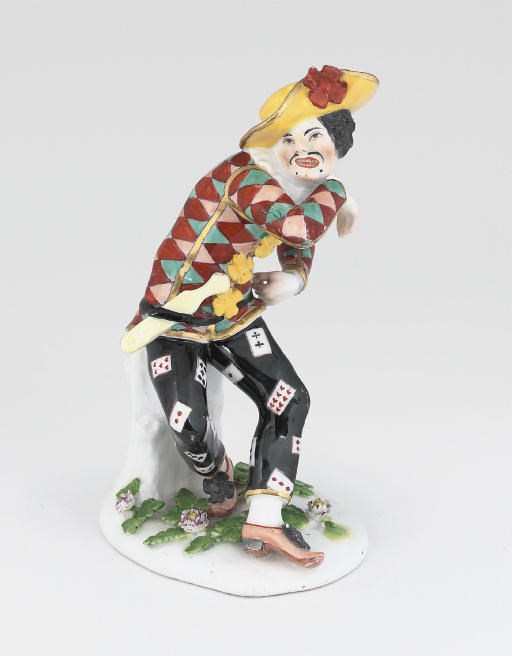 A MEISSEN FIGURE OF THE FRIGHTENED HARLEQUIN