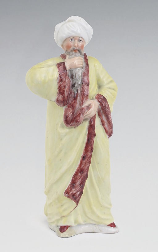 A KLOSTER-VEILSDORF FIGURE OF THE SUPREME JUDGE CADI-LESKIER FROM THE SERIES OF LEVANTINE CHARACTERS