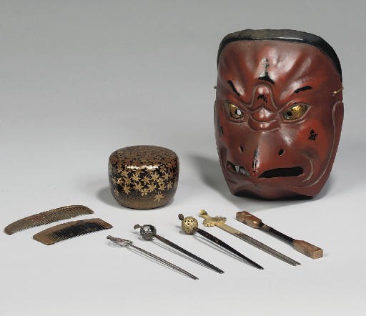 A Japanese red lacquered gesso Tengu mask, 19th Century