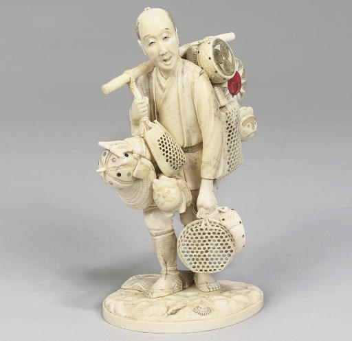 A Japanese ivory okimono, signed Eigyoku, early 20th Century