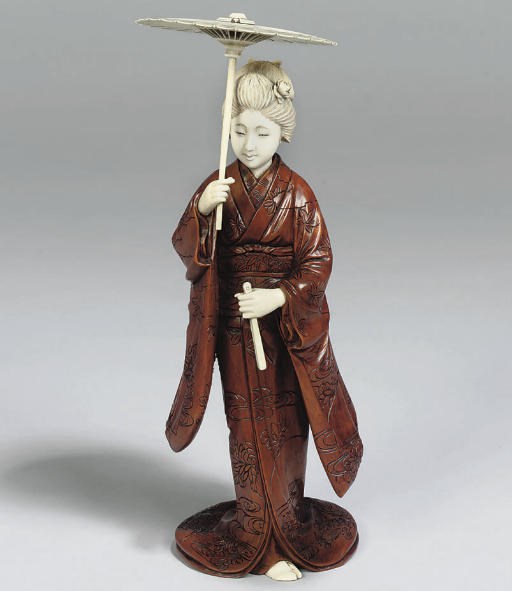 A Japanese Okimono, signed Ikkosai, Meiji Period (1868-1912)