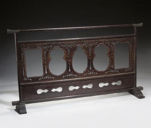 A Japanese hardwood inro stand, 19th century