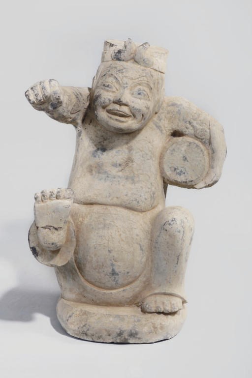 A large Chinese stone sculpture of an entertainer, late 20th century