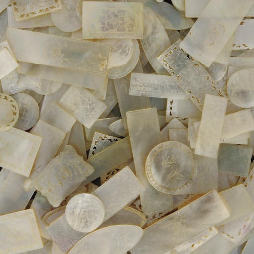 A Collection of Chinese mother-of-pearl gaming counters, 19th Century