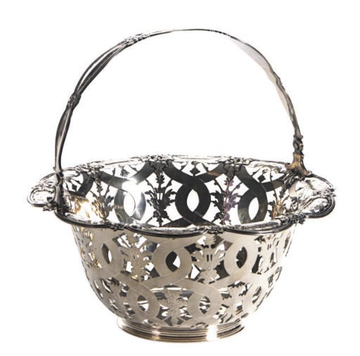 AN AMERICAN SILVER PIERCED BASKET WITH SWING HANDLE,