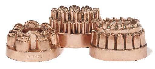 A collection of three Victorian castellated copper jelly moulds
