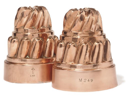 Two similar Victorian castellated copper jelly moulds