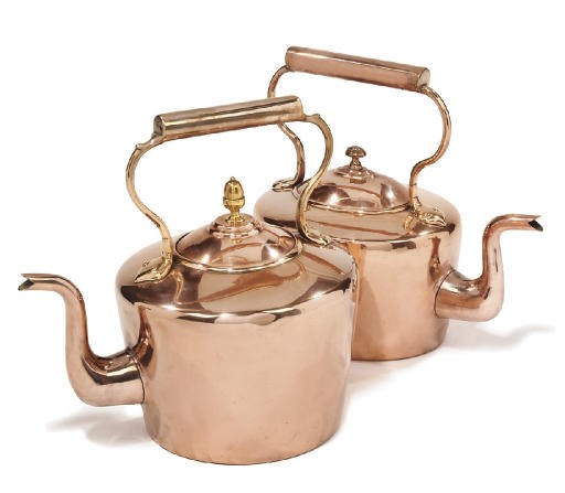A large Victorian oval copper kettle