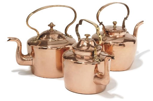 A group of three English copper kettles
