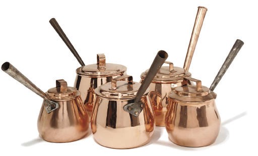 A composite set of five copper bellied saucepans
