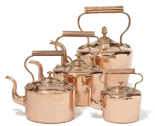 A collection of four Victorian copper kettles